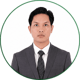 Devijang Gurung, Business Manager, in a dark suit and tie.